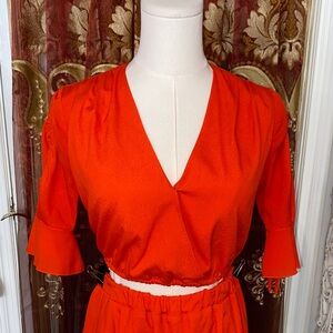 Bebe 2 Piece Orange Top and Pants Set